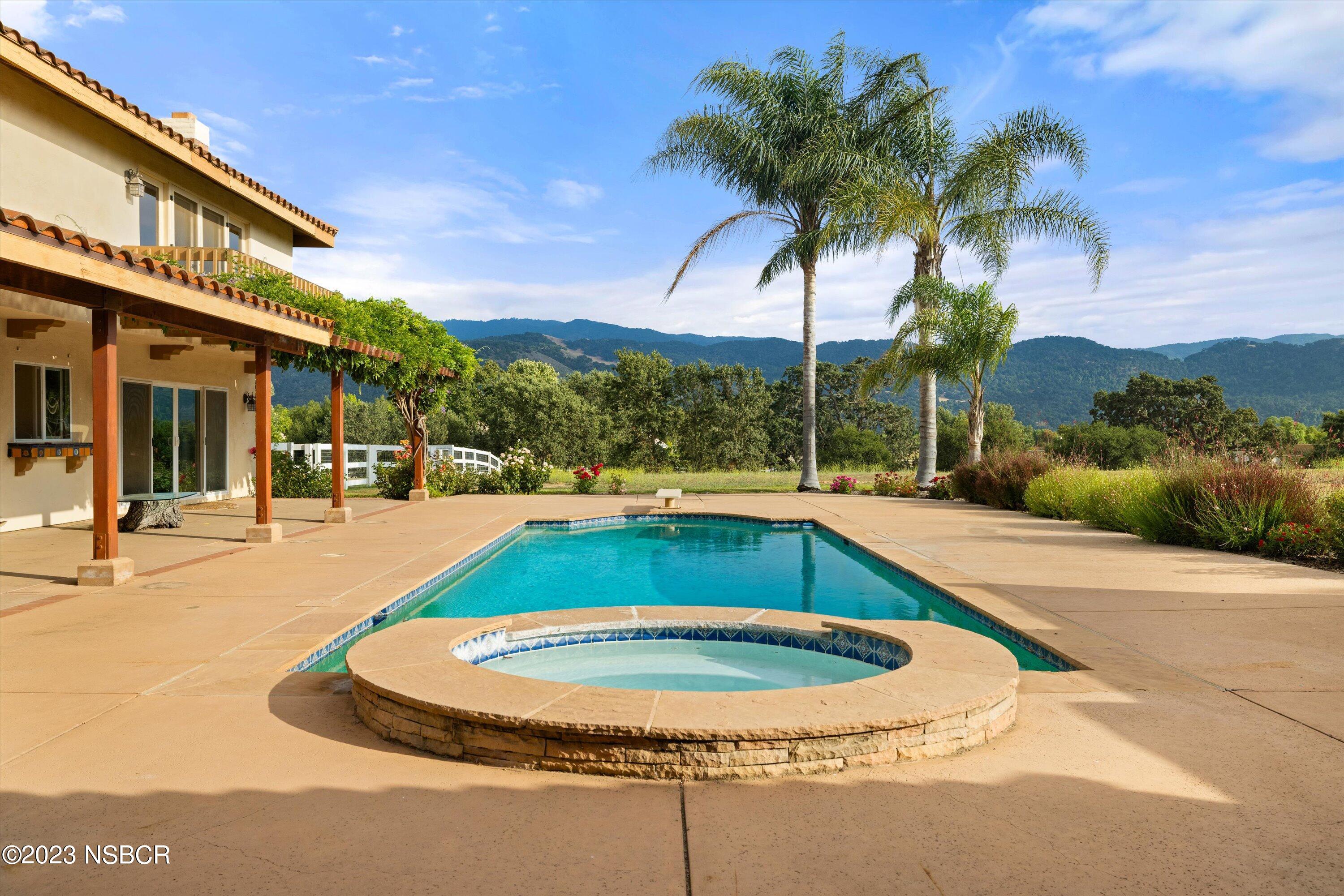 345 Meadowlark Road Santa Ynez, CA 93460 - Photo 42 of 57 a view of a swimming pool with a patio