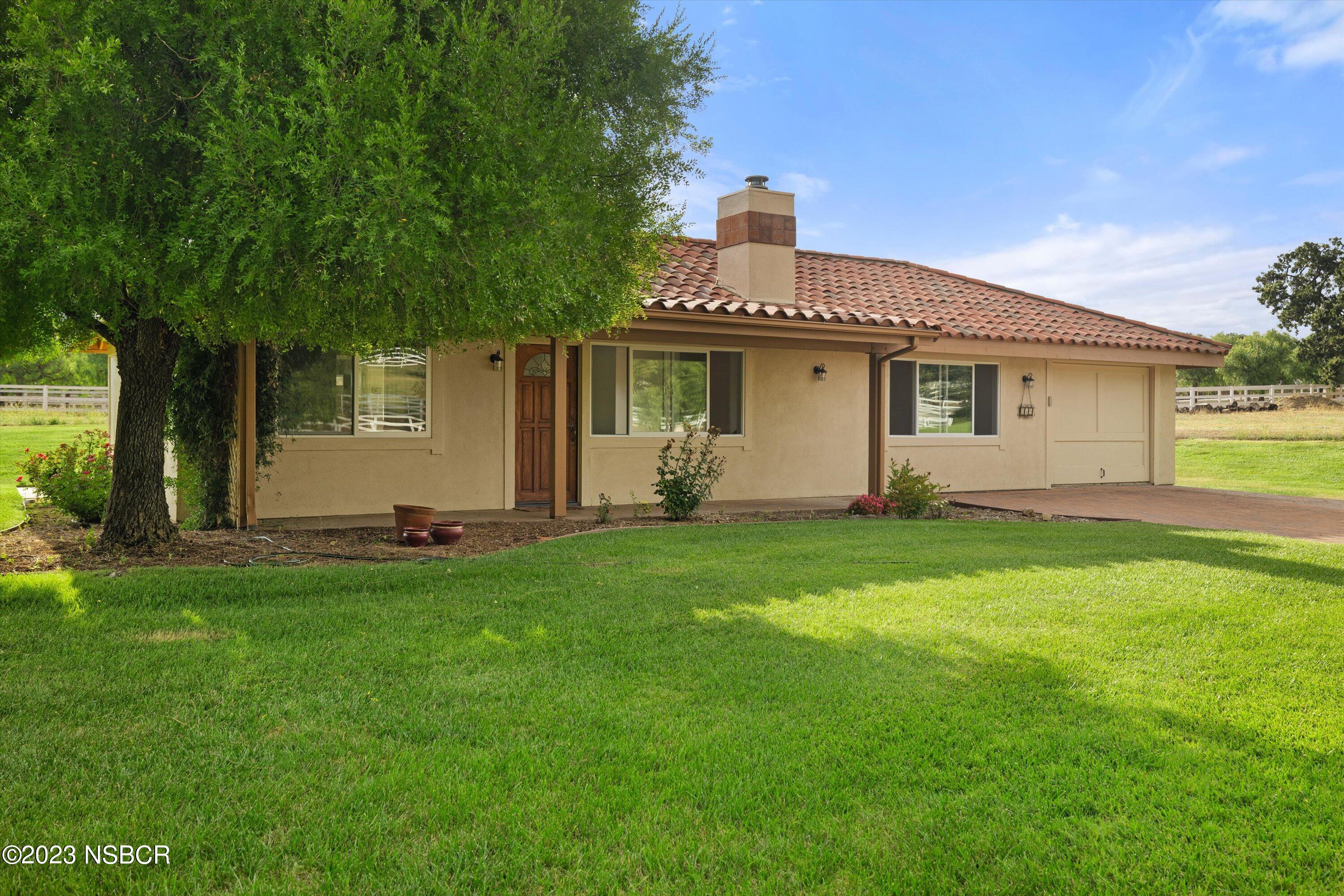 345 Meadowlark Road Santa Ynez, CA 93460 - Photo 47 of 57 a front view of house with yard and green space