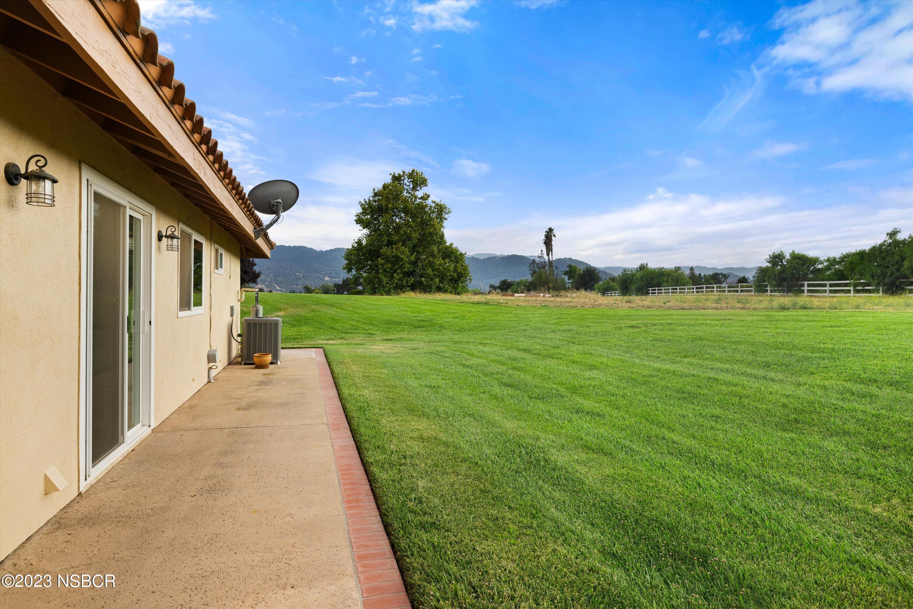 345 Meadowlark Road Santa Ynez, CA 93460 - Photo 54 of 57 a view of a house with a big yard
