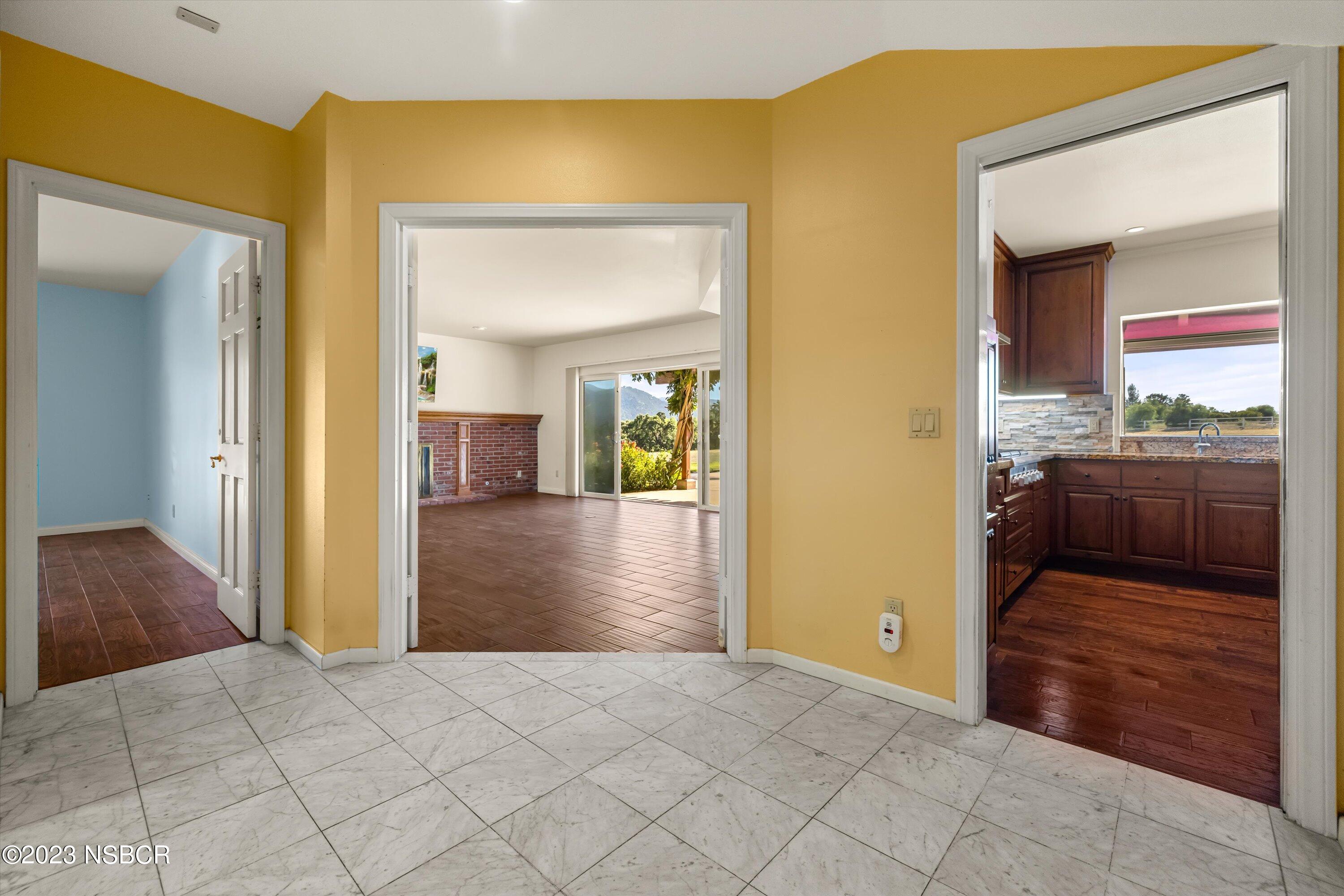 345 Meadowlark Road Santa Ynez, CA 93460 - Photo 7 of 57 a view of a hallway view with wooden floor and staircase