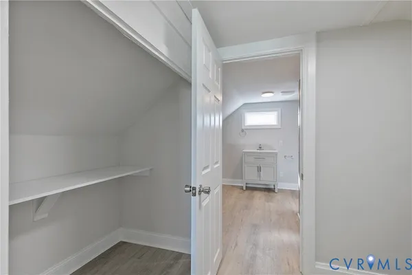a bathroom with a toilet a sink and shower