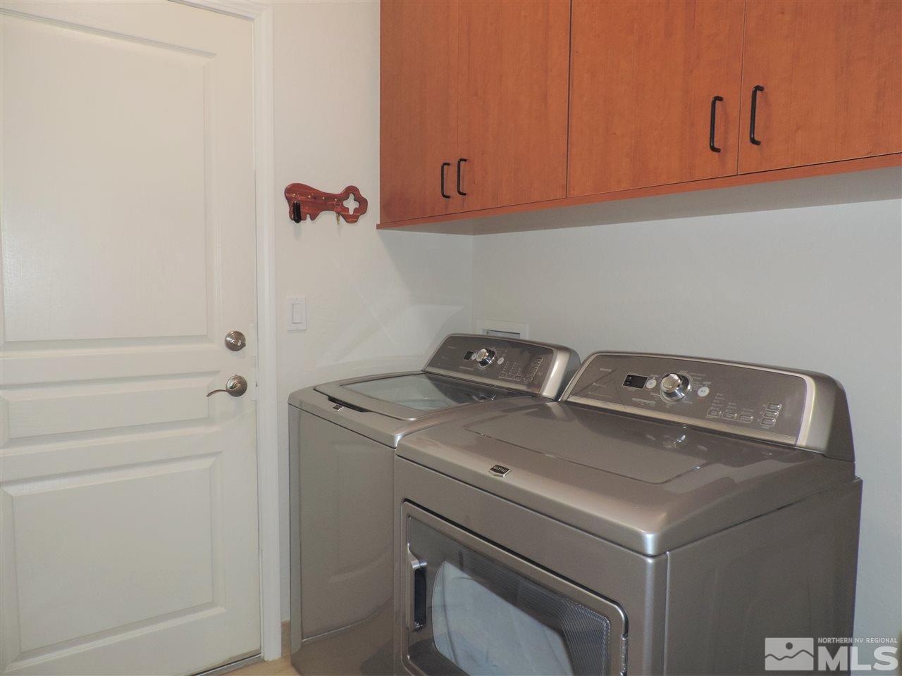 9142 Mount Pleasant Drive Reno, NV 89523 - Photo 14 of 34 a utility room with dryer and washer