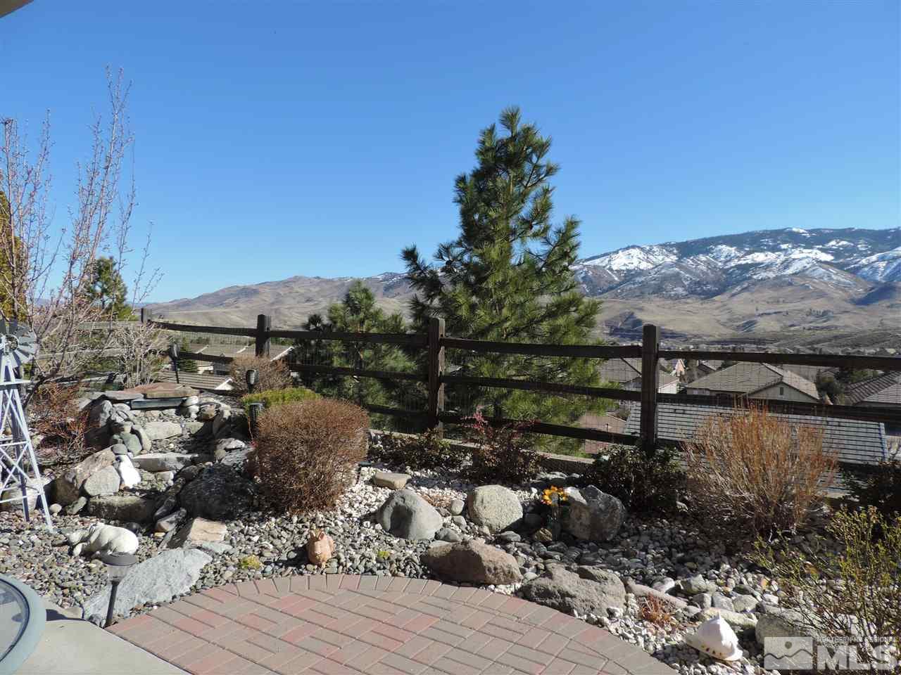 9142 Mount Pleasant Drive Reno, NV 89523 - Photo 15 of 34 a view of a houses with a yard