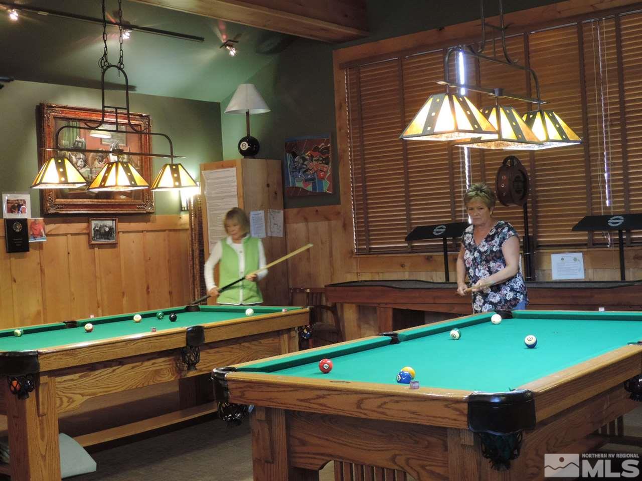 9142 Mount Pleasant Drive Reno, NV 89523 - Photo 24 of 34 a room with pool table and windows