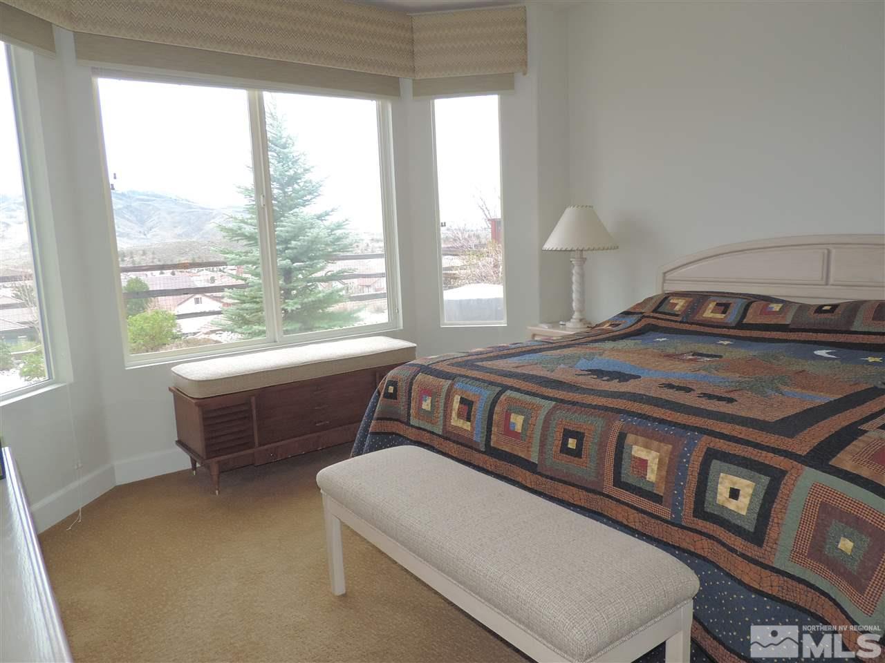 9142 Mount Pleasant Drive Reno, NV 89523 - Photo 8 of 34 a living room with furniture and a window