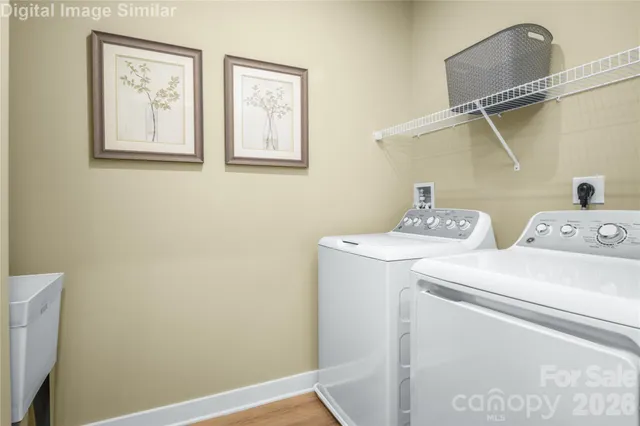 a utility room with dryer and washer