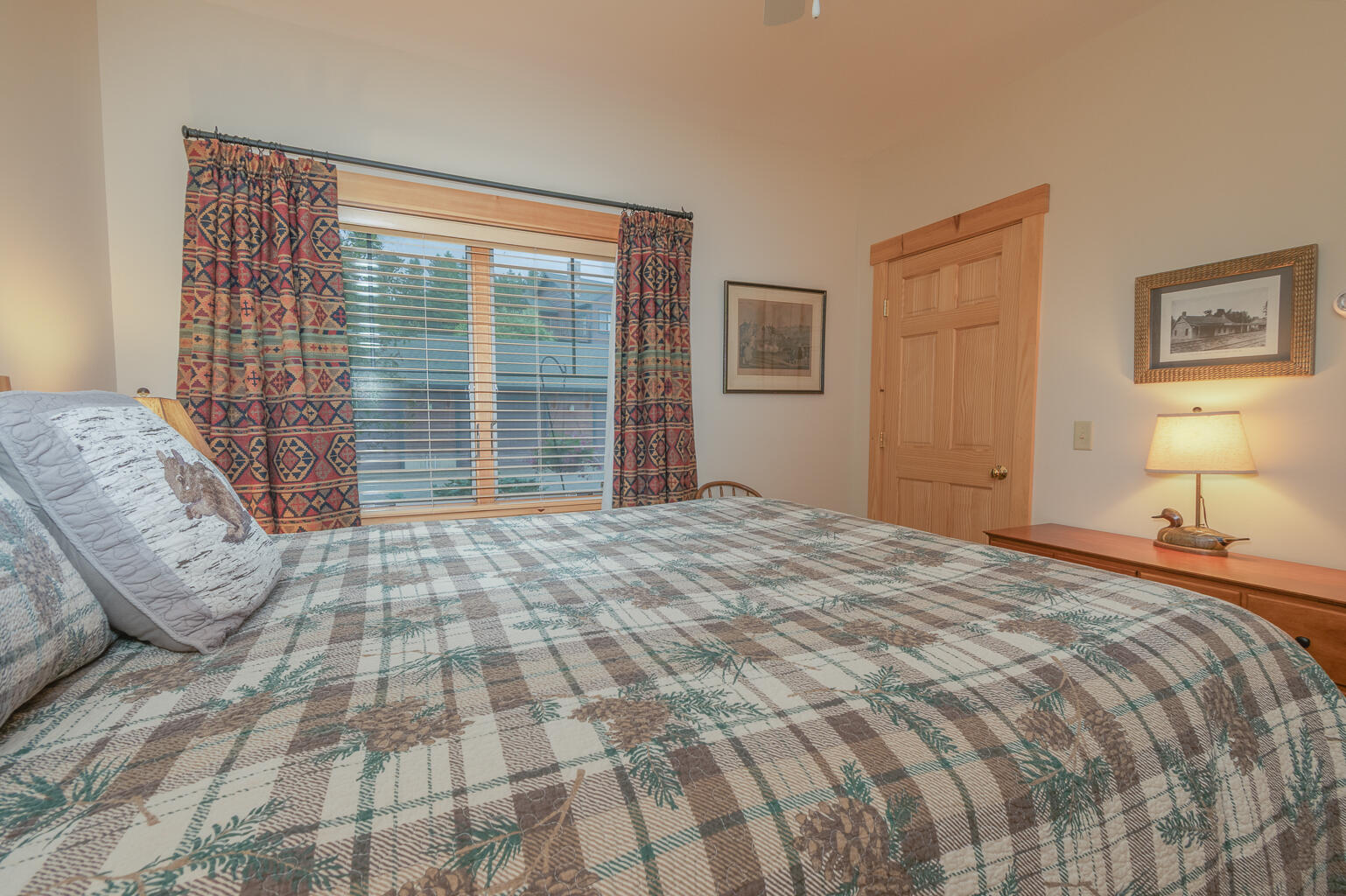 26 Whip Willow Farm Road, Unit 10 Rangeley, ME 04970 - Photo 14 of 35 First floor primary bedroom