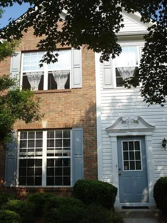 a view of front a house with a yard