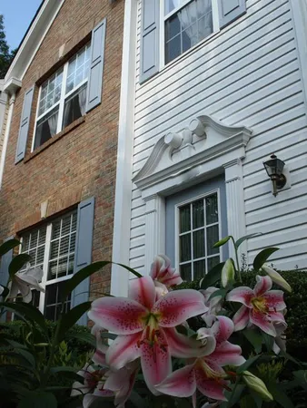 a front view of house with an outdoor seating