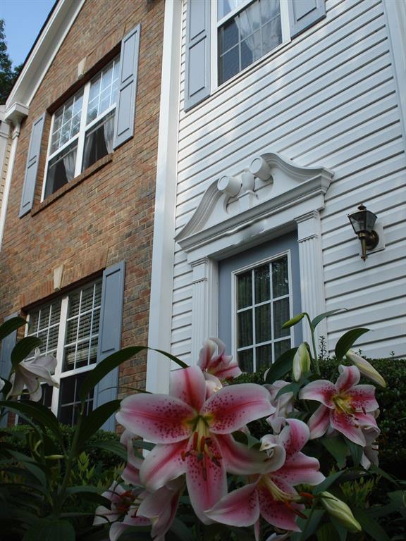 3722 Berkeley Crossing Duluth, GA 30096 - Photo 2 of 15 a front view of house with an outdoor seating
