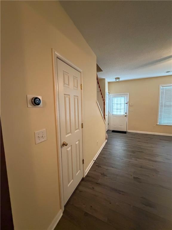 3722 Berkeley Crossing Duluth, GA 30096 - Photo 6 of 15 a view of a livingroom with wooden floor and stairs