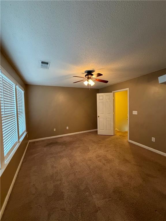 3722 Berkeley Crossing Duluth, GA 30096 - Photo 8 of 15 a view of an empty room with a window