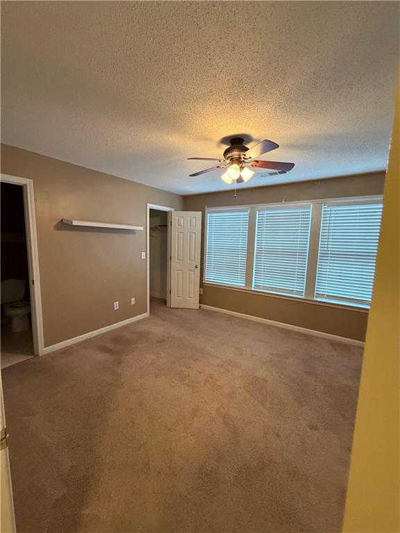 3722 Berkeley Crossing Duluth, GA 30096 - Photo 9 of 15 a view of an empty room with a window