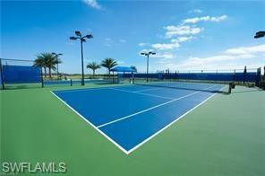 5857 Constitution Street Ave Maria, FL 34142 - Photo 35 of 40 a view of a tennis court