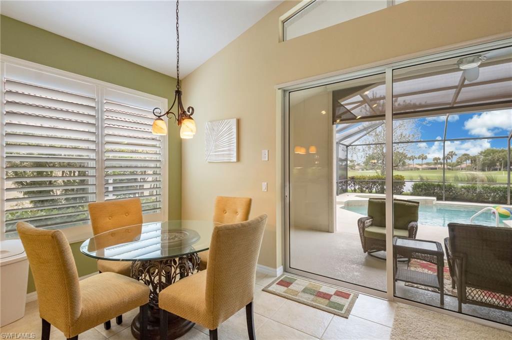 5857 Constitution Street Ave Maria, FL 34142 - Photo 9 of 40 a view of a dining room with furniture window and outside view