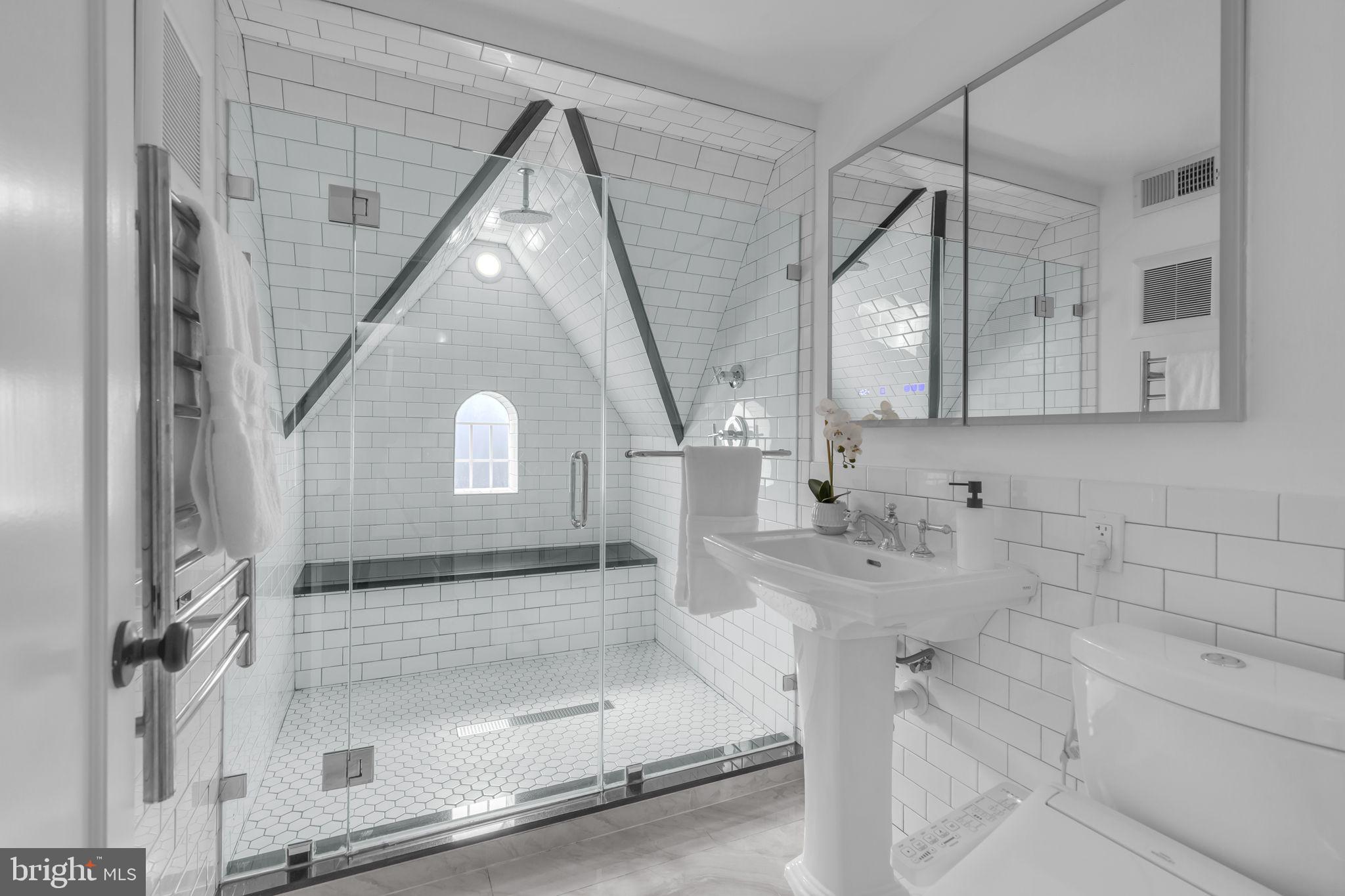 8603 Cedar Street Silver Spring, MD 20910 - Photo 17 of 46 a bathroom with a sink and mirror
