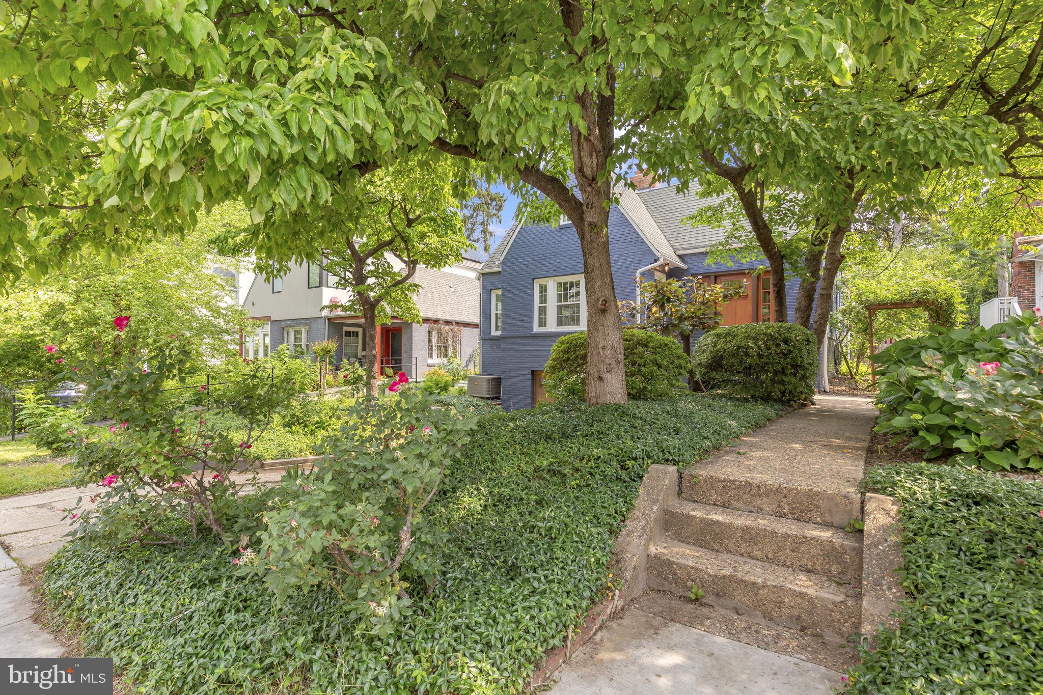 8603 Cedar Street Silver Spring, MD 20910 - Photo 33 of 46 a front view of a house with a yard