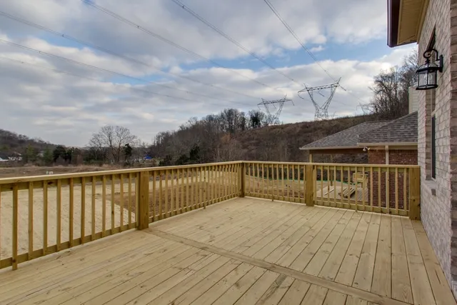 a view of a brick house with many windows