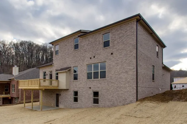 a front view of a house with a garage