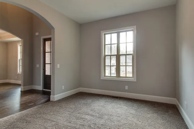 an empty room with windows