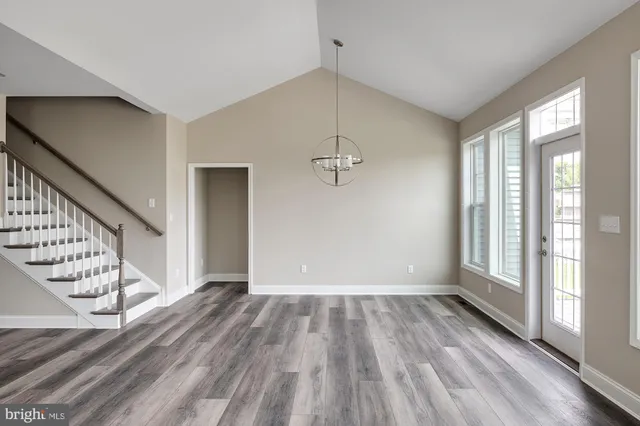 a bathroom with a double vanity sink mirror and shower