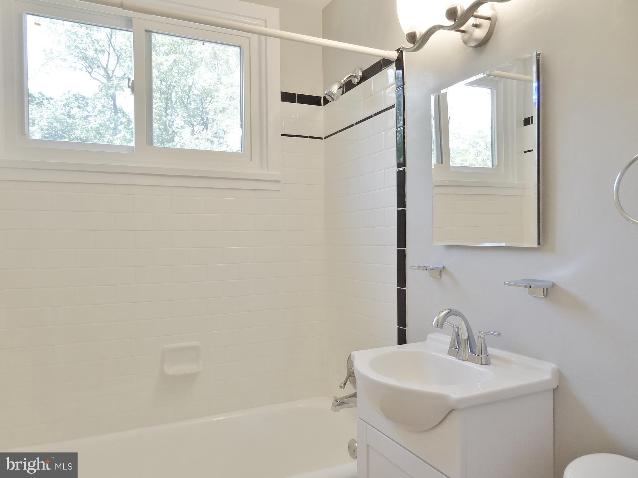 Remodeled ceramic-tiled bath