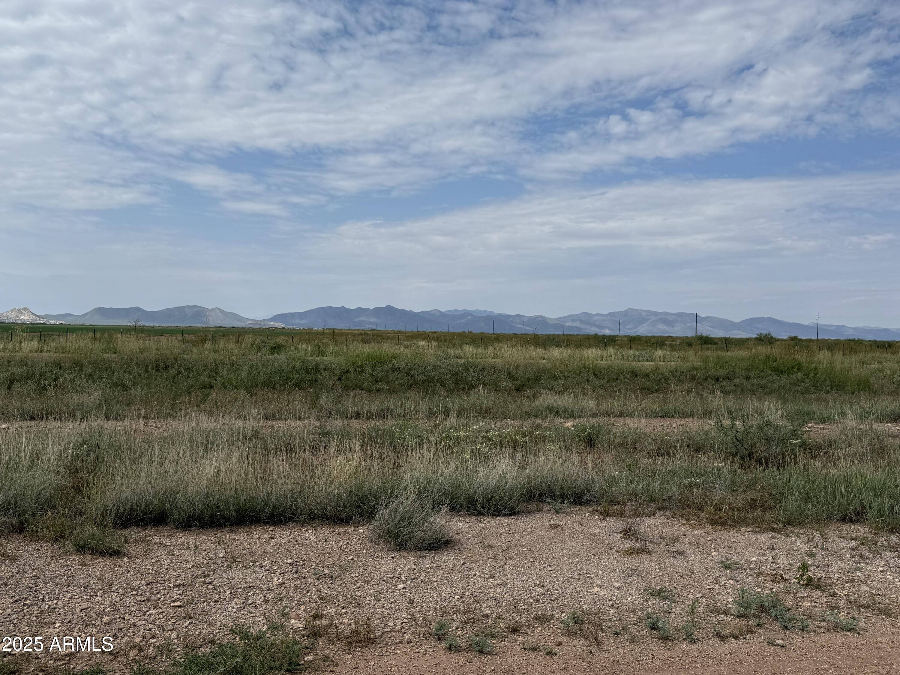 1.39-ac North Old Brooks Road, Unit 964 Douglas, AZ 85607 - Photo 5 of 12 a view of a lake with a yard