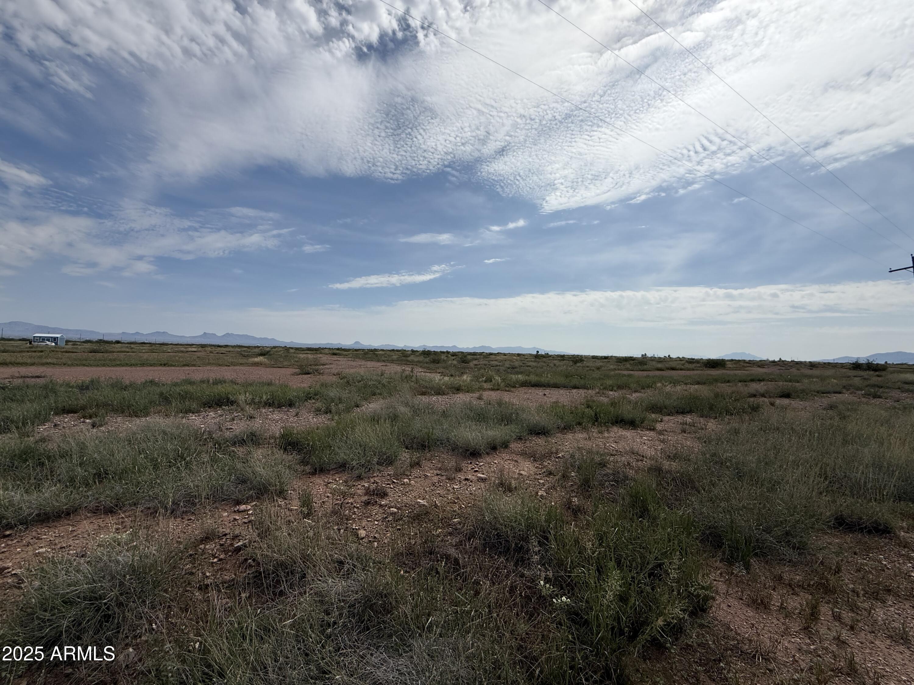 1.39-ac North Old Brooks Road, Unit 964 Douglas, AZ 85607 - Photo 6 of 12 a view of a yard and mountain