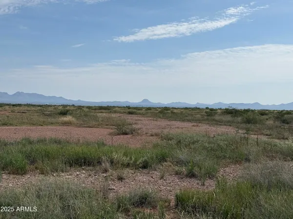 a view of a lake and mountain in the back