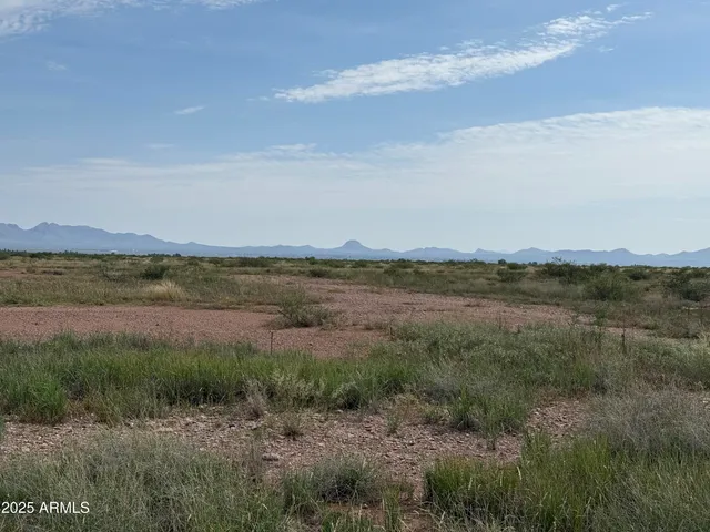 a view of a lake and mountain in the back
