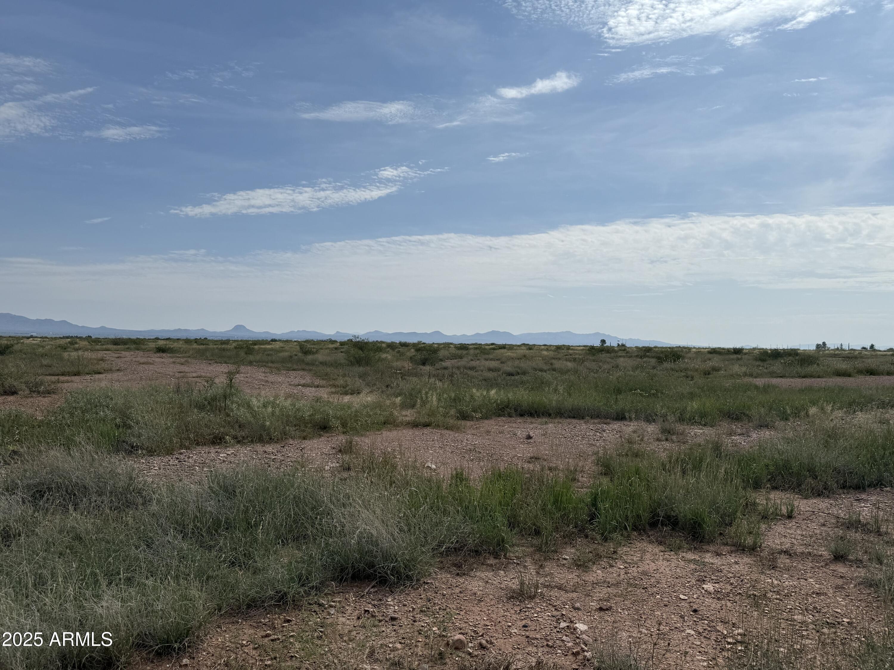 1.39-ac North Old Brooks Road, Unit 964 Douglas, AZ 85607 - Photo 9 of 12 a view of a lake and green valley