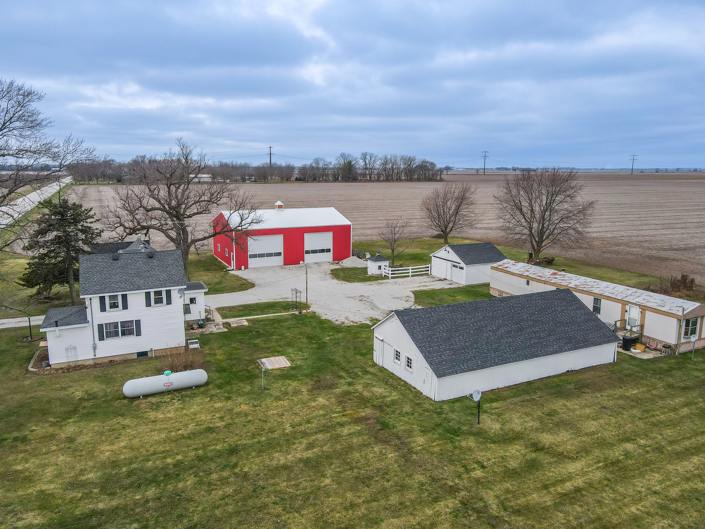 1565 B West 9000 North Road Manteno, IL 60950 - Photo 10 of 11 a view of a house with a yard