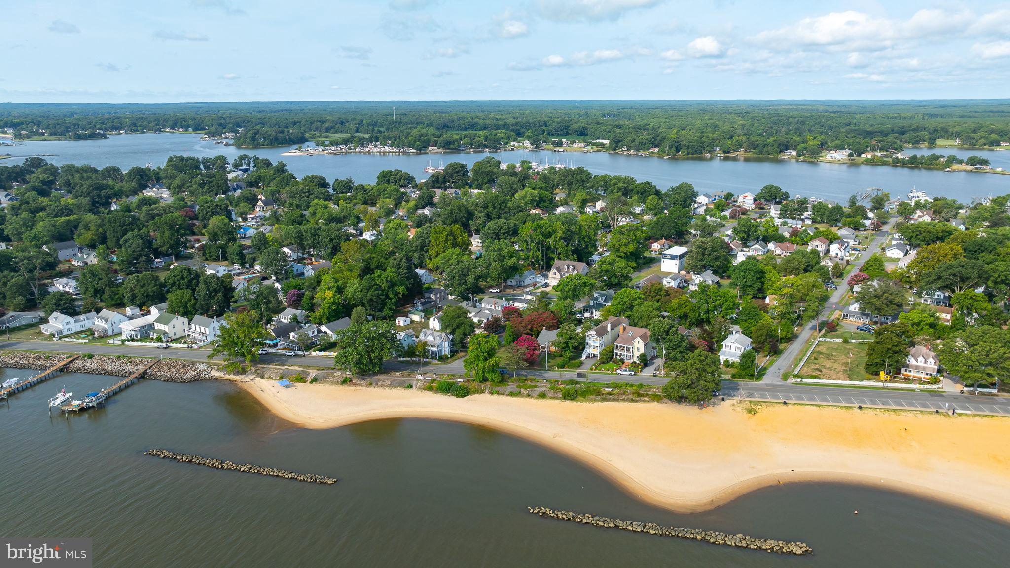 312 9th Street Colonial Beach, VA 22443 - Photo 51 of 62 Charming riverside community with lush greenery.