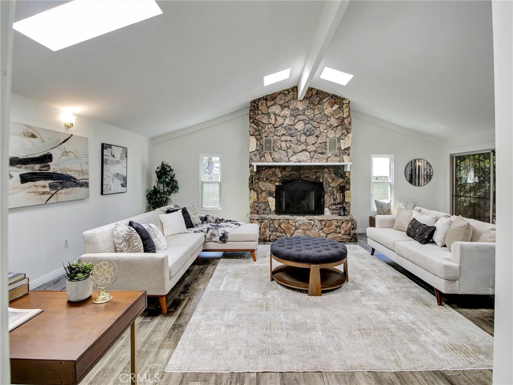 17815 Lysander Drive Carson, CA 90746 - Photo 12 of 24 a living room with furniture and a fireplace