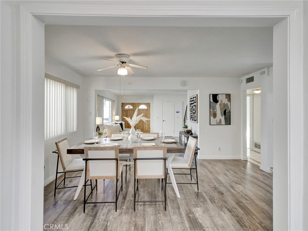 17815 Lysander Drive Carson, CA 90746 - Photo 16 of 24 a view of a dining room with furniture window and wooden floor