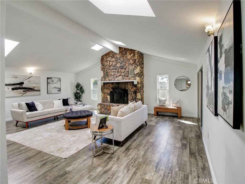 17815 Lysander Drive Carson, CA 90746 - Photo 17 of 24 a living room with furniture and a fireplace