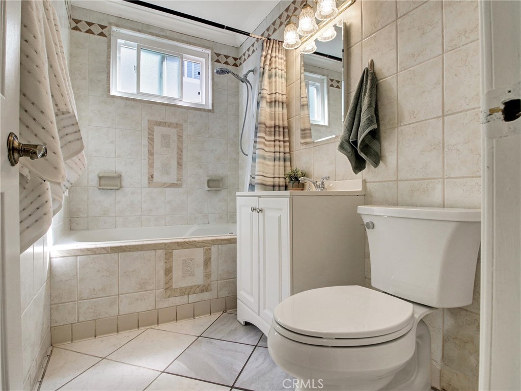 17815 Lysander Drive Carson, CA 90746 - Photo 18 of 24 a bathroom with a toilet and a shower