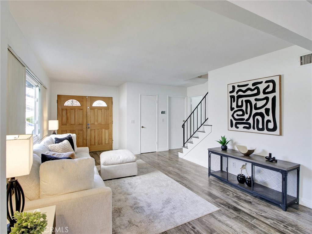 17815 Lysander Drive Carson, CA 90746 - Photo 8 of 24 a living room with furniture and a window