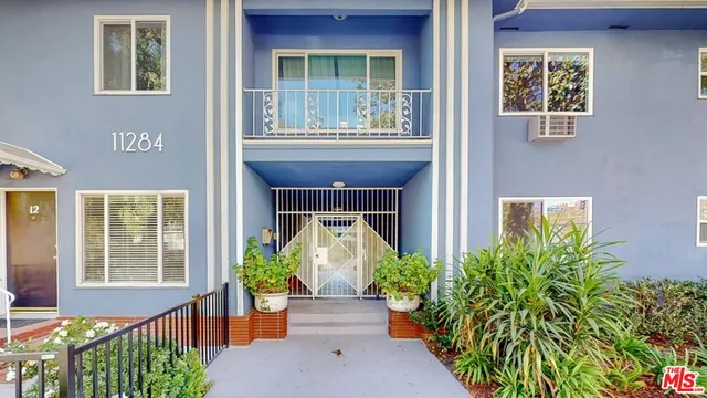 a front view of a house having yard