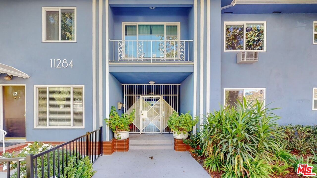 a front view of a house having yard