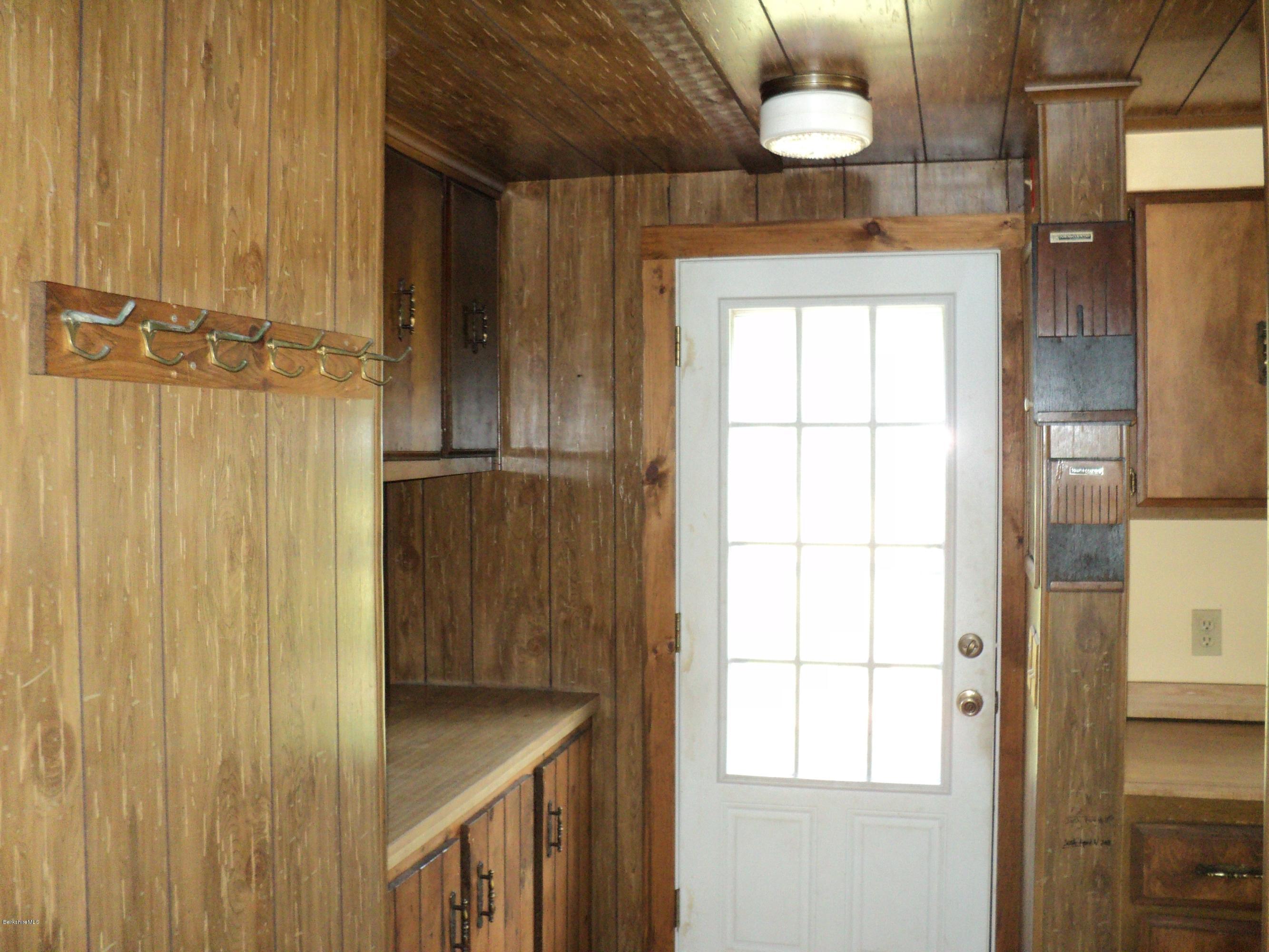 135 Tyringham Road Lee, MA 01238 - Photo 12 of 19 a view of a bathroom with a sink and a window