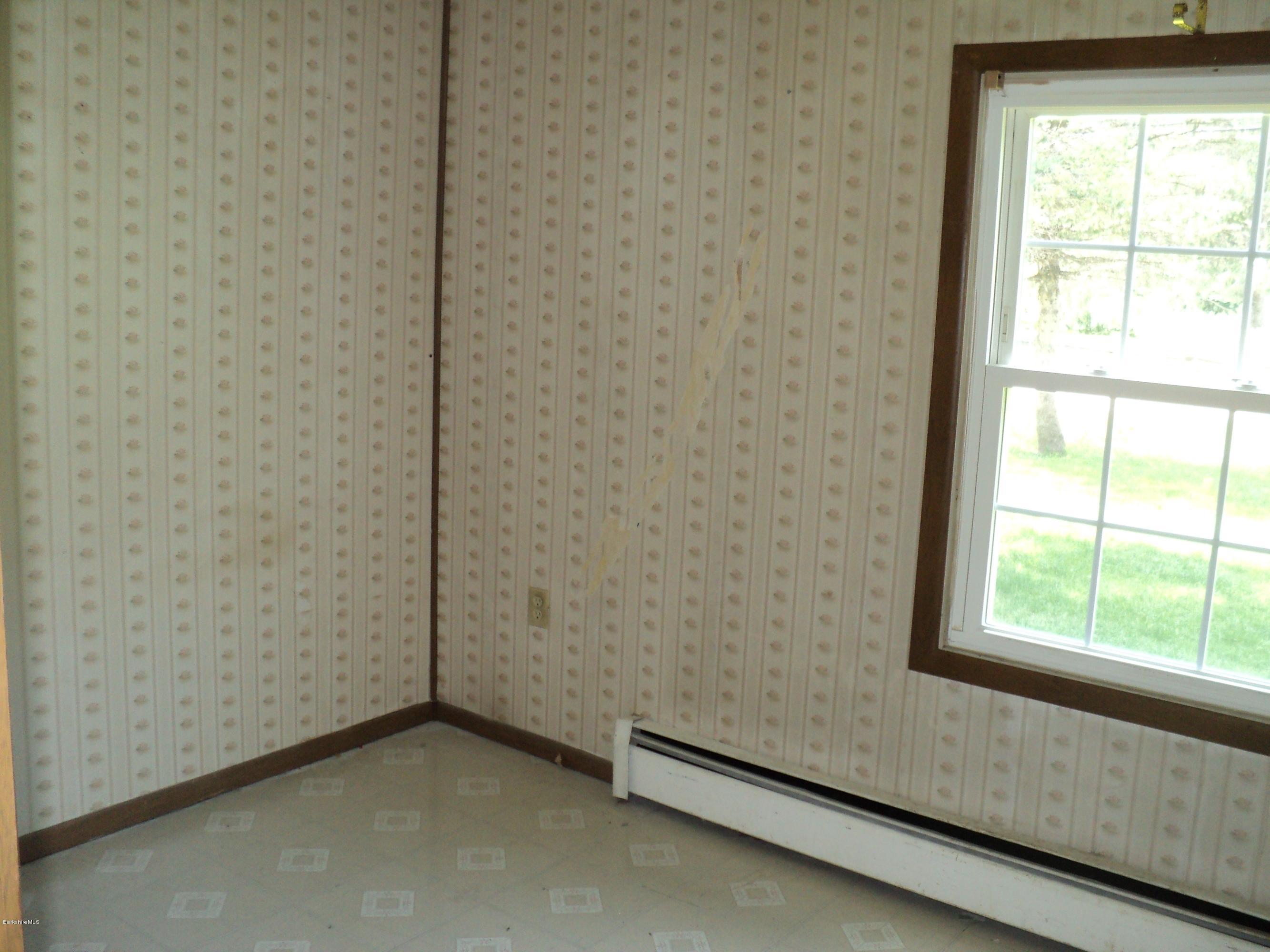 135 Tyringham Road Lee, MA 01238 - Photo 17 of 19 a view of a small space with a window