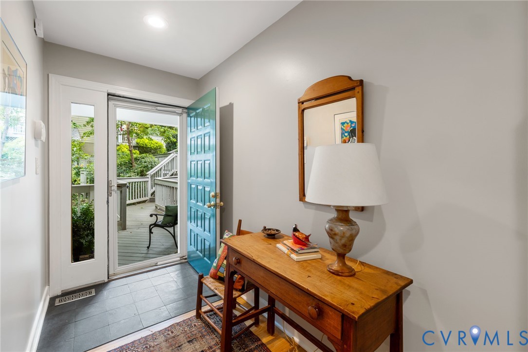 3111 Stony Point Road, Unit D Richmond, VA 23235 - Photo 3 of 32 Entryway featuring a bright blue paneled door, bla
