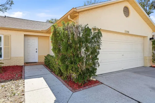 a view of a back yard of the house