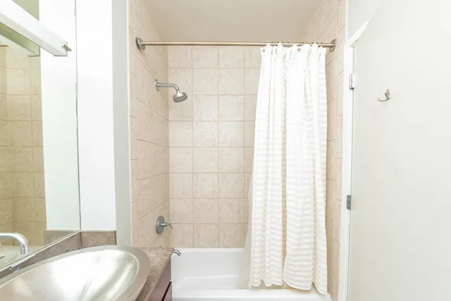 a bathroom with a sink and a bathtub
