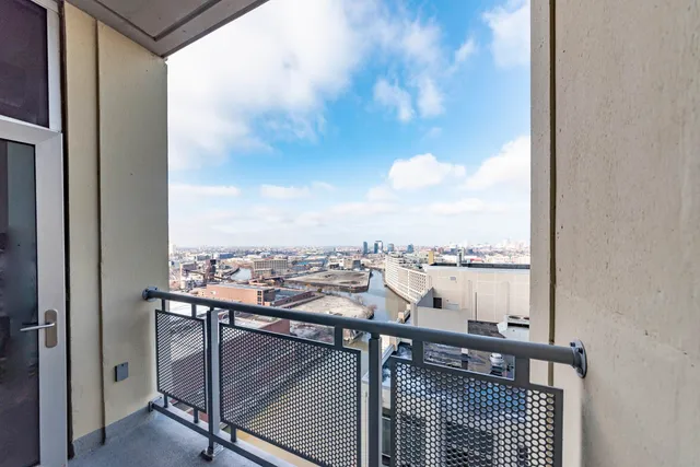 a view of a balcony next to a lake view