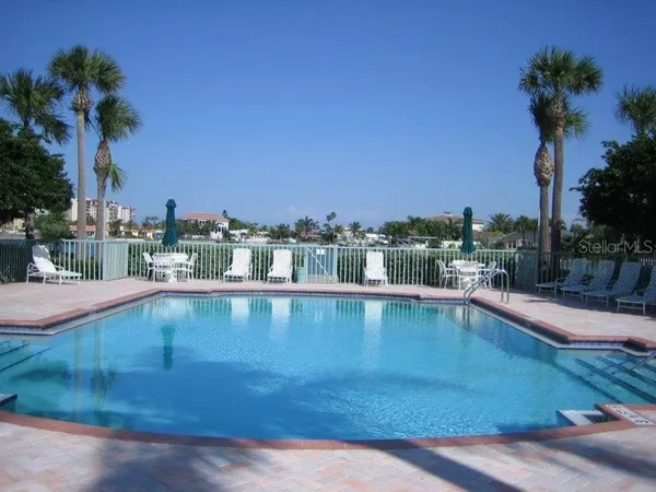 a view of a swimming pool and a terrace