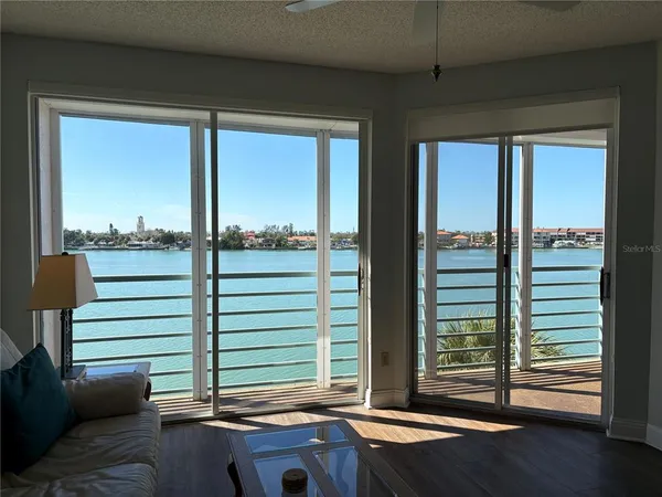 a view of a room with a large window