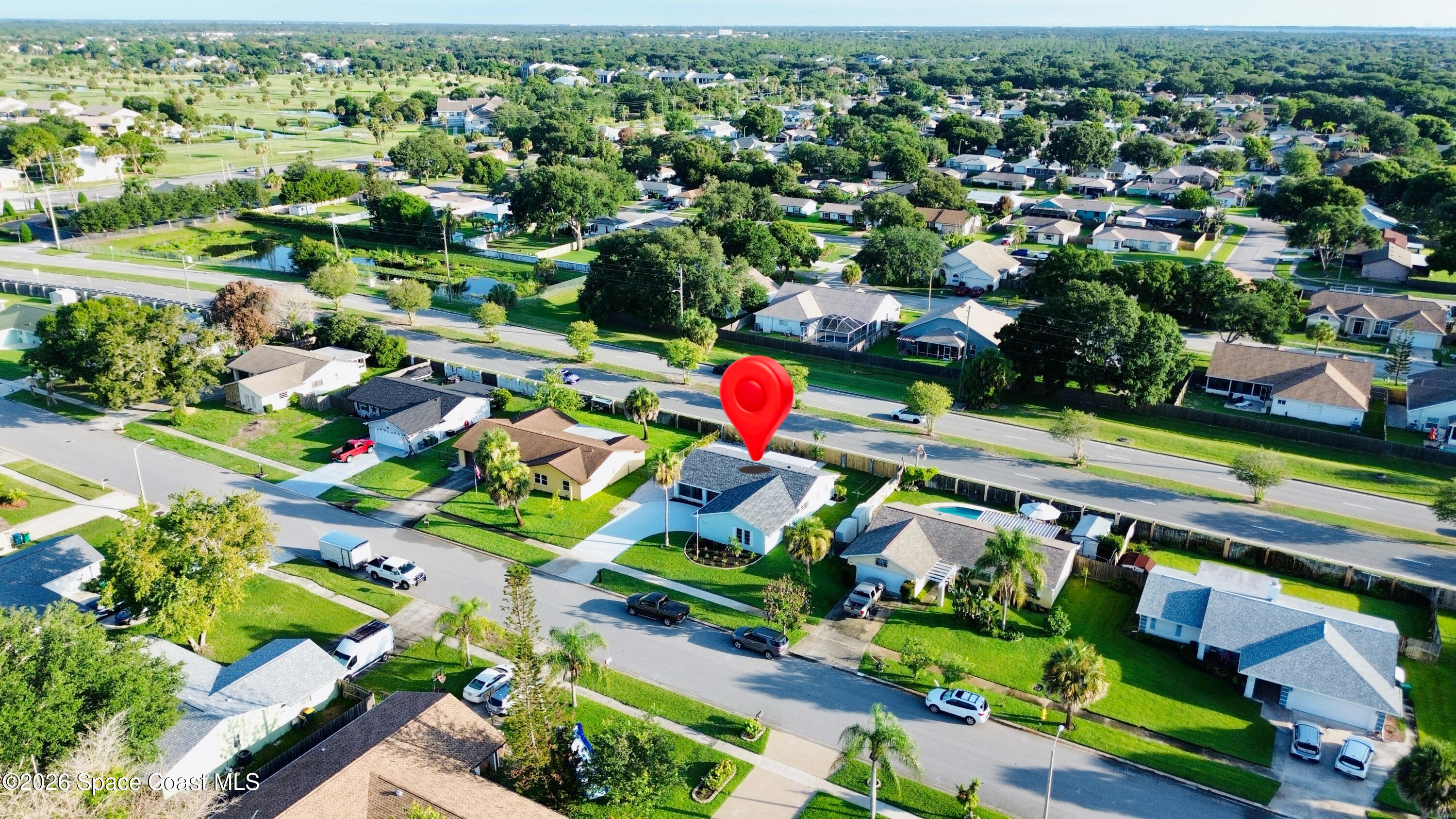 1910 Tallridge Road Melbourne, FL 32935 - Photo 32 of 34 drone 3 2