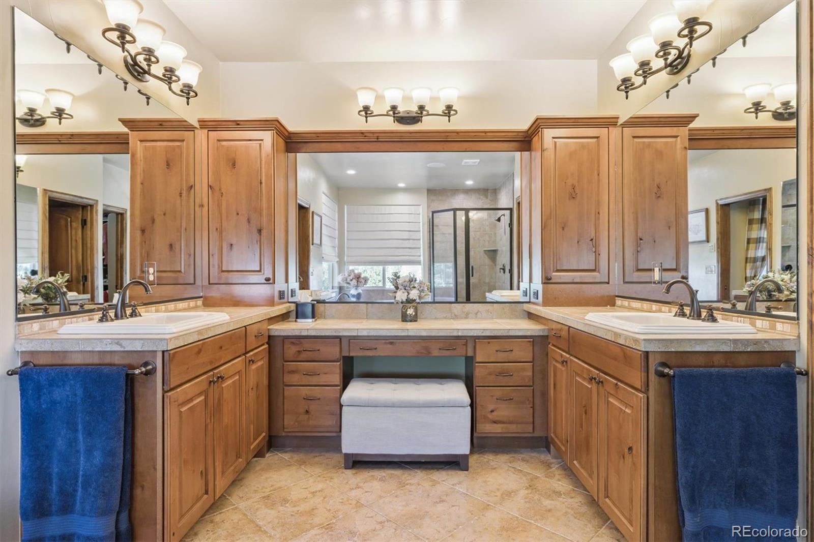 7994 Monarch Road Larkspur, CO 80118 - Photo 15 of 48 a kitchen with a sink and a stove